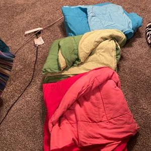 Twin comforters in three colors